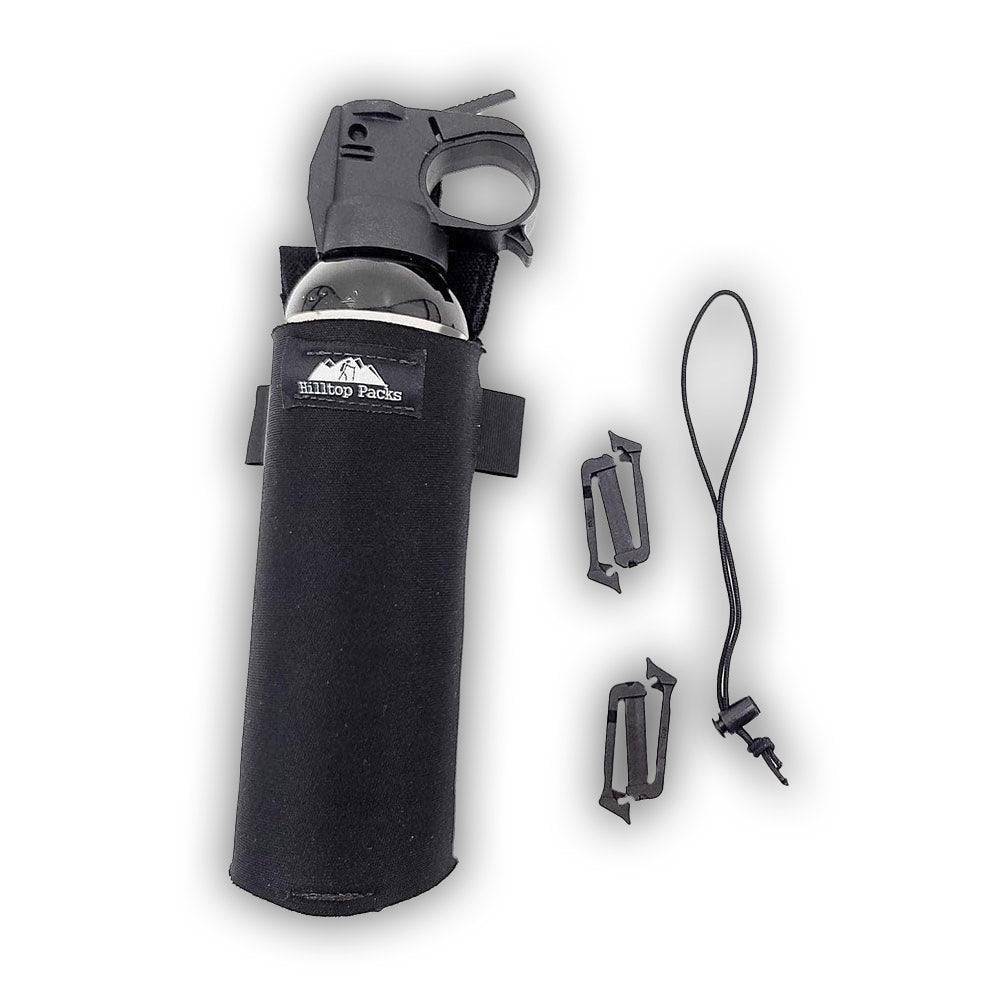 Bear spray holder holster with mounting clips and secure loop for belt or shoulder strap carrying