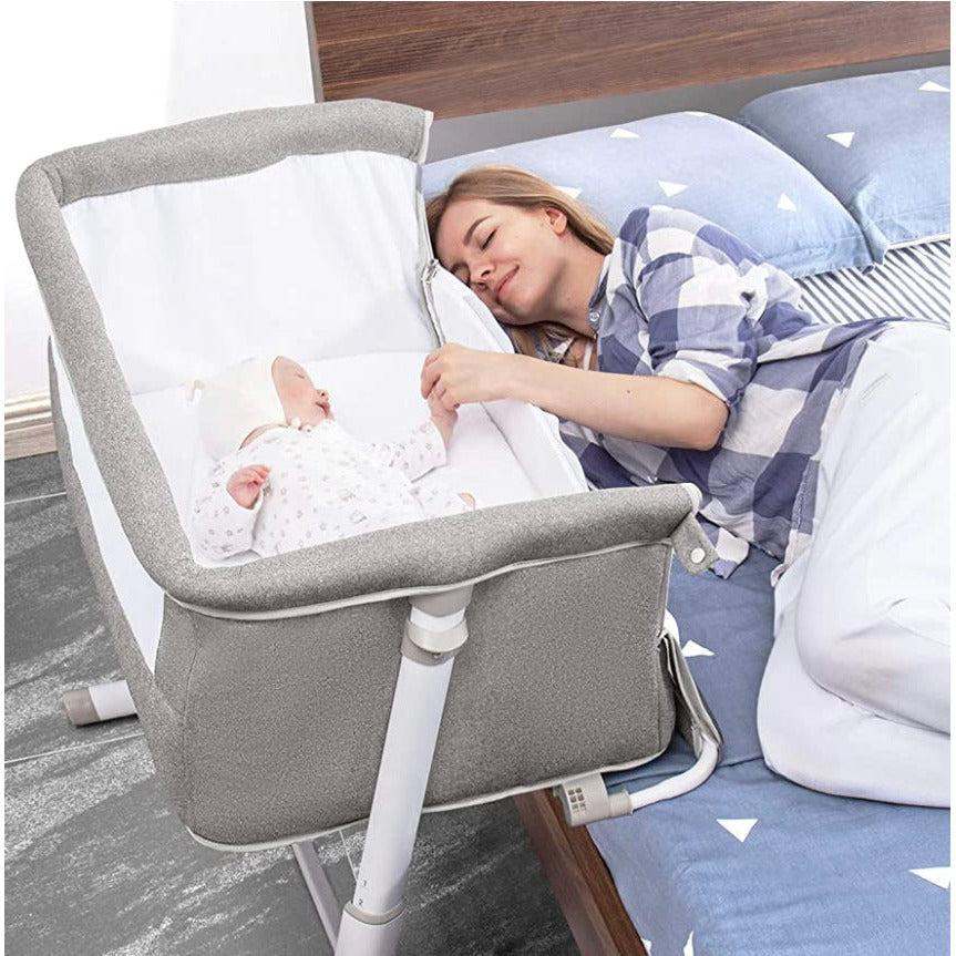 Comfy Mattress Adjustable Bedside Crib with mesh sides and adjustable height feature for convenient night feeds.