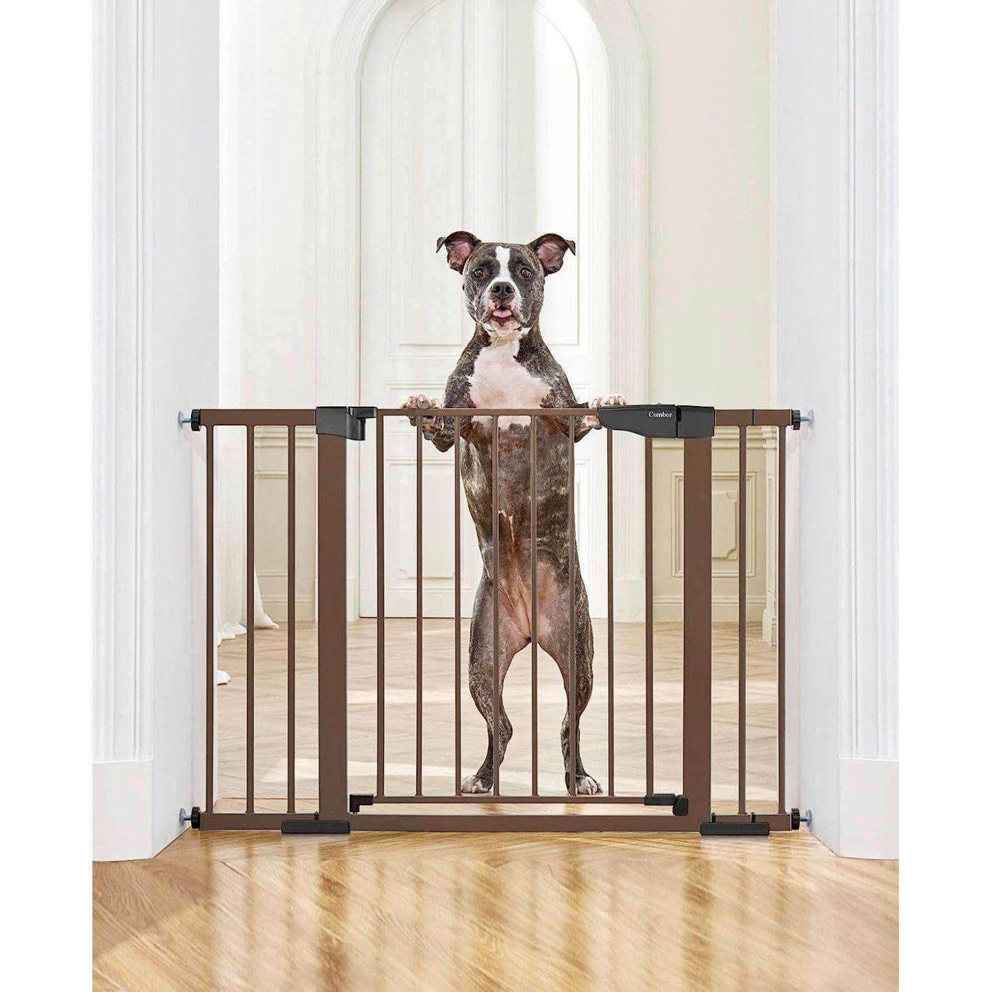 Award-winning Cumbor 29.7-46" auto-close baby gate for stairs in brown, featuring a steel design and easy installation.