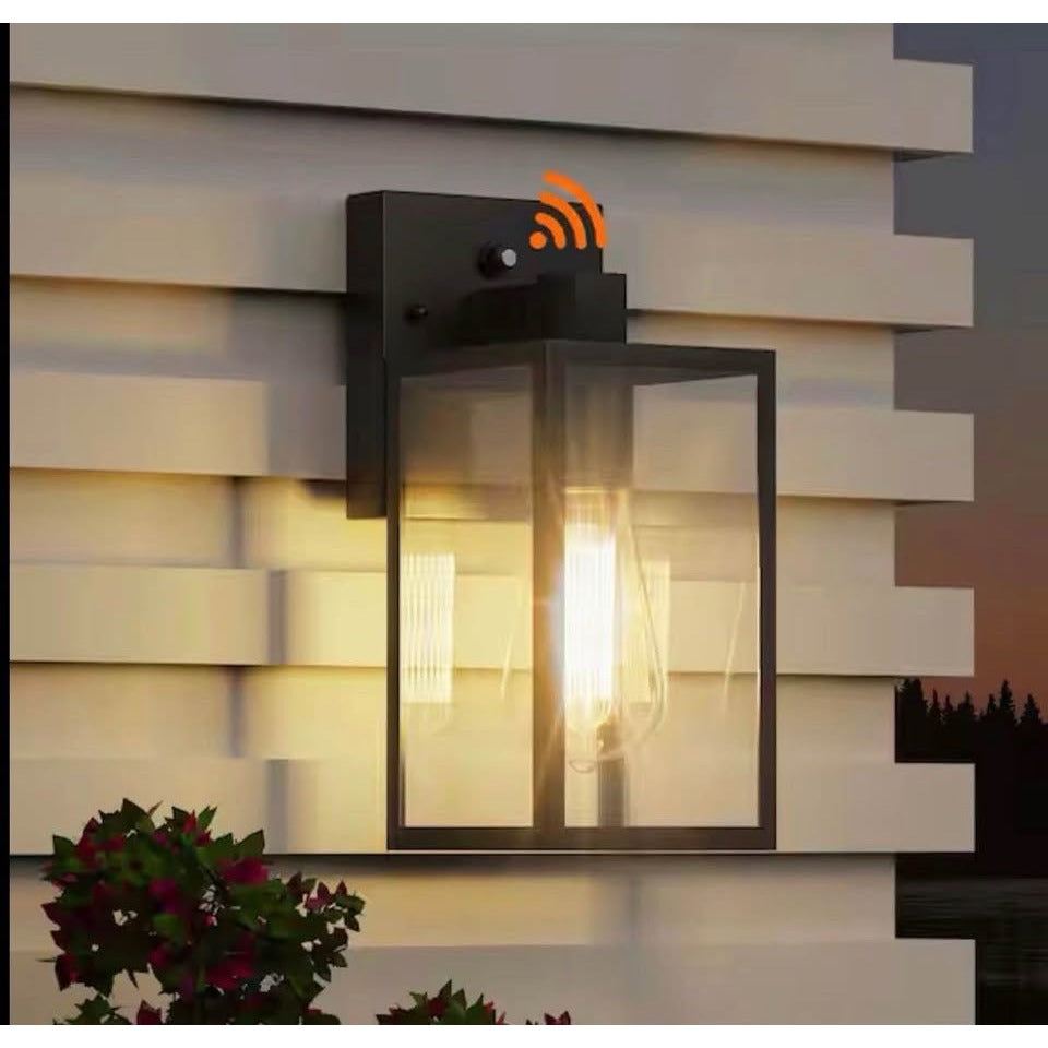 Black modern outdoor lighting fixture with waterproof sensor and clear glass wall sconce