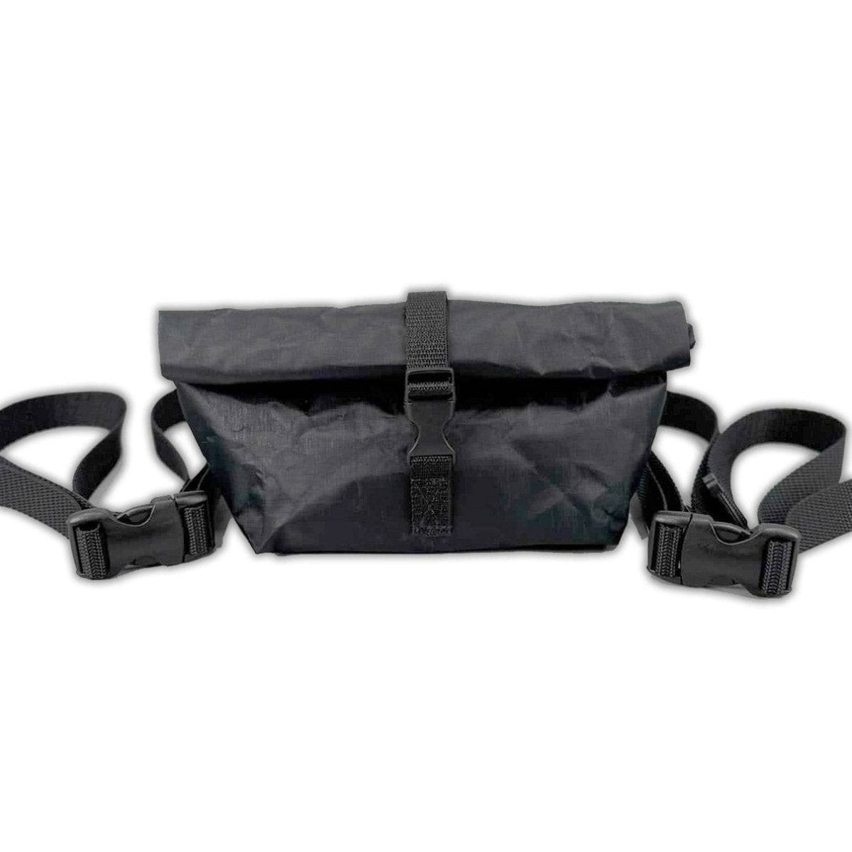 Black ultralight Dyneema roll top fanny pack with adjustable straps and buckle closure designed for hiking and outdoor use