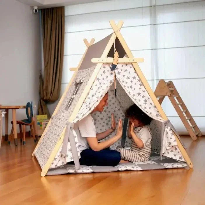 XL play tent with star-patterned fabric, wooden frame, and cushioned mat for indoor kids' play.