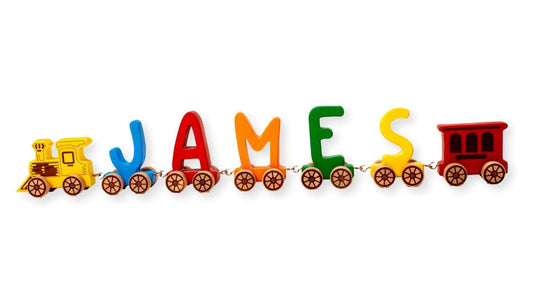 Wooden Letter Train puzzle spelling JAMES in colorful letters on connected train cars for kids