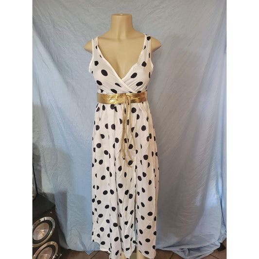 White Mundefeis polka dot belted dress with deep V-neck on mannequin